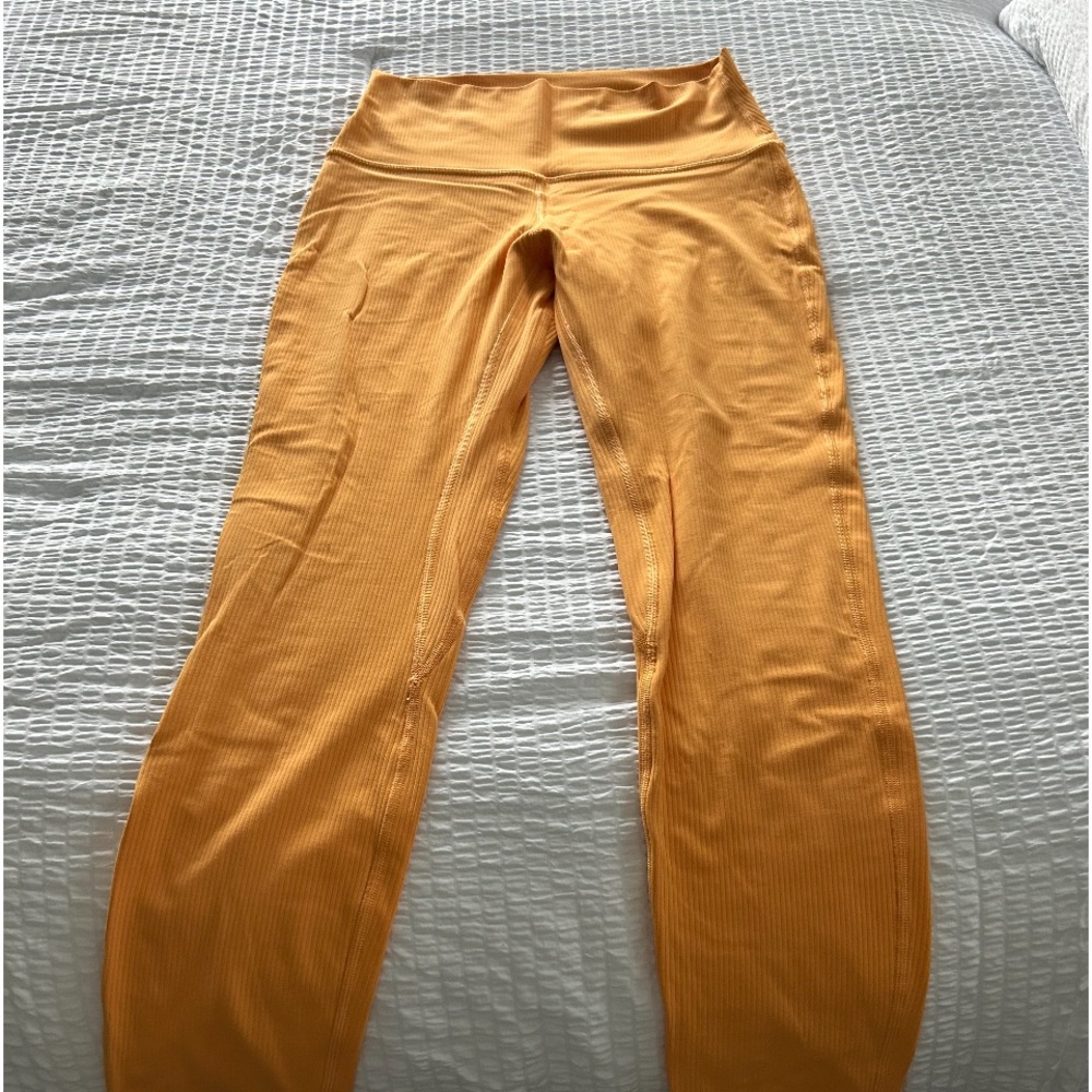 Lululemon size 6 ribbed Melon Align 25 in leggings. 
Brand new